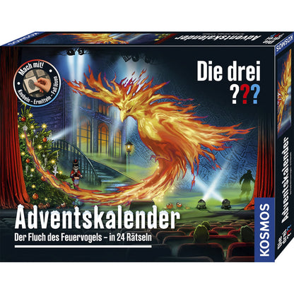 Vorderseite des KOSMOS Die drei ??? Adventskalenders 2026 „Der Fluch des Feuervogels“ mit einem leuchtenden Feuervogel vor einer Theaterkulisse.